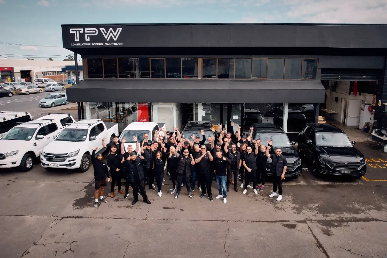 TPW team in front of building